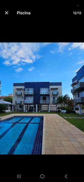 Apartment with swimming pool by the beach